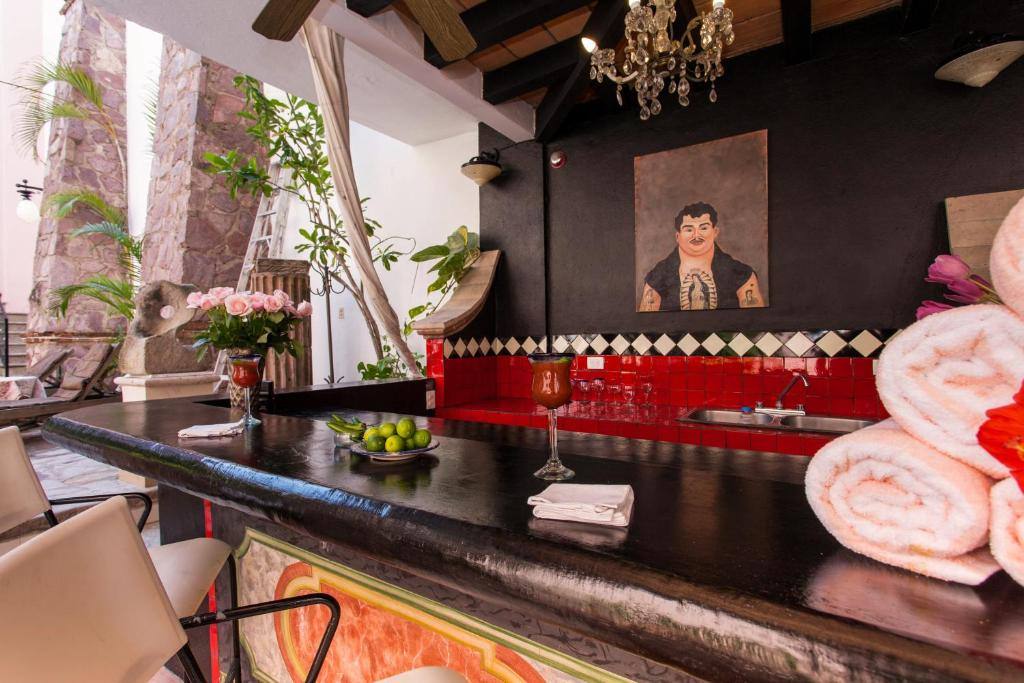 Garlands Del Rio Riverside Boutique Hotel: Bar/lounge
